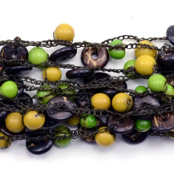 A bracelet, that has been made with coconut and acai seeds on crocheted threads.