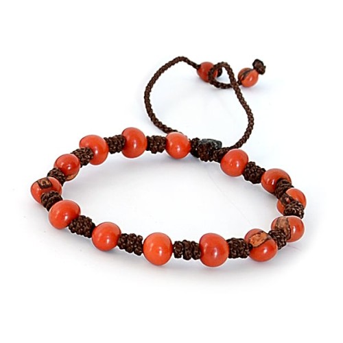 A close up picture to show you the detail on the simple seed bracelet, this color is orange