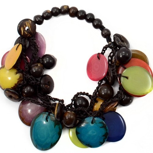 The storm bracelet, drops of tagua, coconut, and acai, that dangle from strands to make a bracelet.
