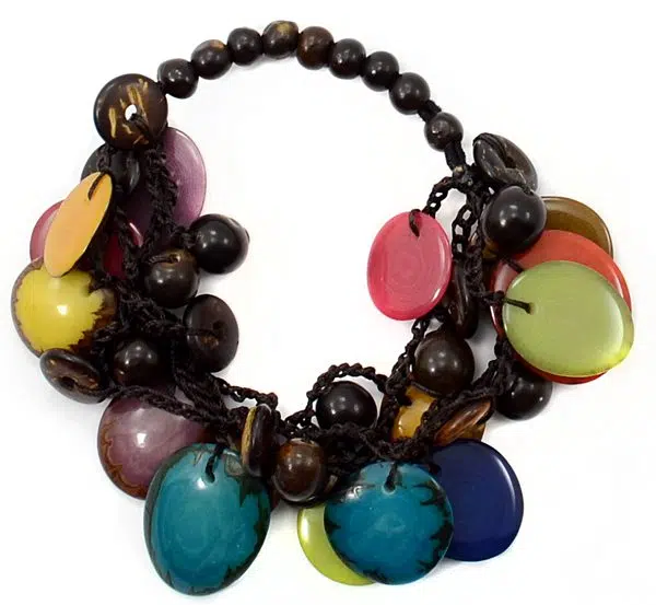 The storm bracelet, drops of tagua, coconut, and acai, that dangle from strands to make a bracelet.