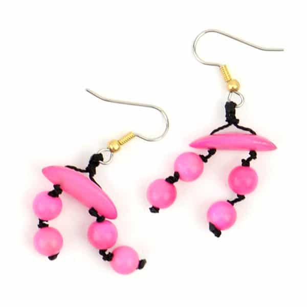 A close up of picture of the daub earrings, there color is pink.