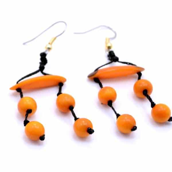 A close up of picture of the daub earrings, there color is orange.