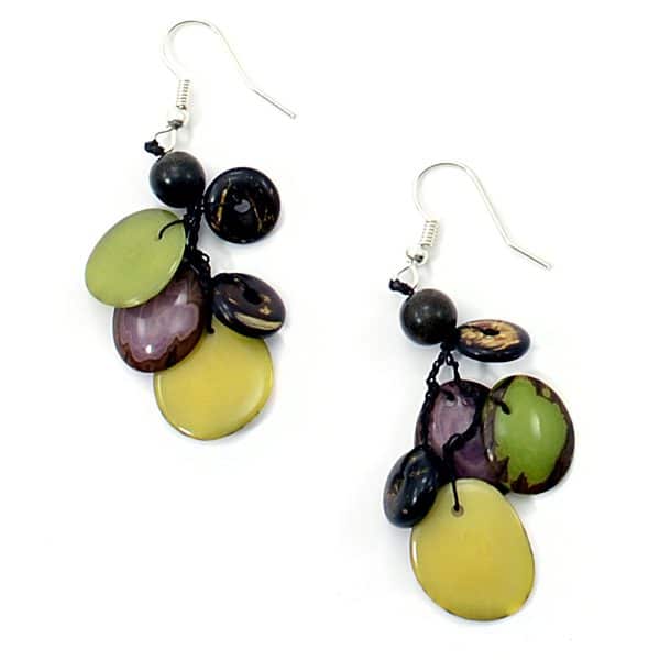A picture of tagua pieces that have been dyed, and dangling from strands of crocheted threads, these earrings are called, tagua storm earrings.