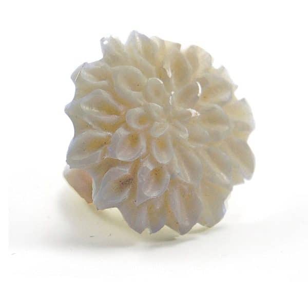 A close up picture of the tagua chrysanthemum ring.