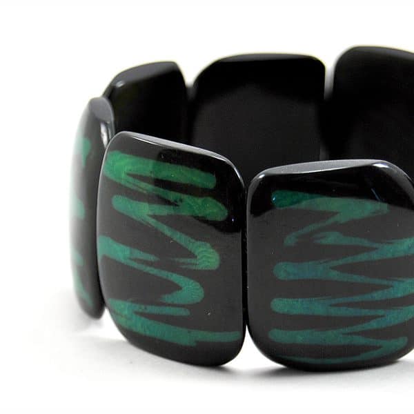A close up of the batiki bracelet in the green color.