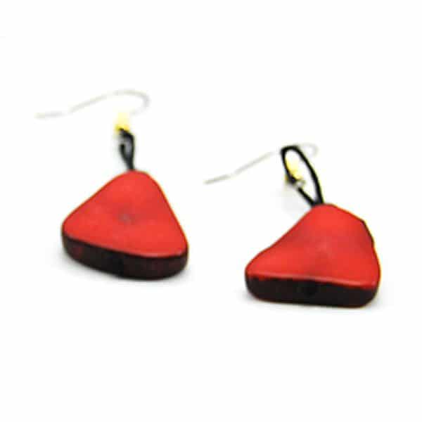 Tagua beads in organic shapes, comes in a verity of colors, the color in this picture is red.