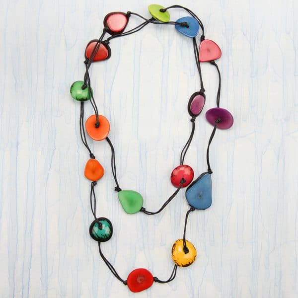 A necklace that has lily pad like tagua beads, that come in a range of colors, this picture has the multi color it.