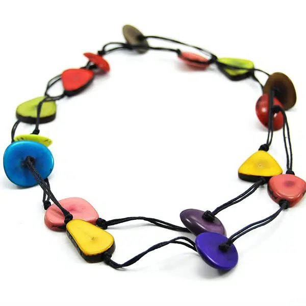 A necklace that has lily pad like tagua beads, that come in a range of colors, this picture has the multi color it.