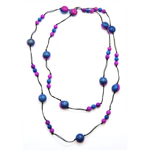 A fun and bright necklace that has tagua beads attached to it, this necklace is know as the sandwich necklace.