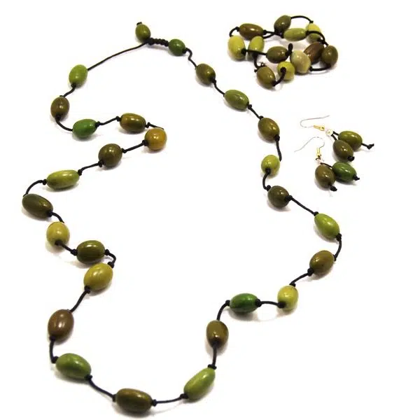 A picture of the olive strand set, bisola seeds strung together, comes in a verity of colors, this color is green.