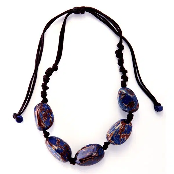 A picture of the stonewashed necklace, comes in a verity of colors, the color of the rocks in this picture are blue.