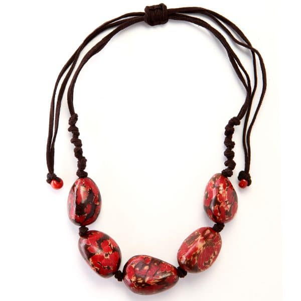 A picture of the stonewashed necklace, comes in a verity of colors, the color of the rocks in this picture are red.