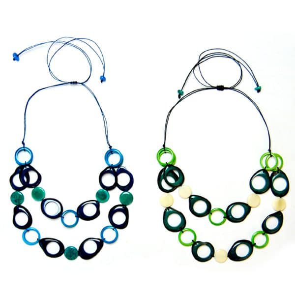 A picture of two groovy necklace next to each other, there colors are, green and turquoise.