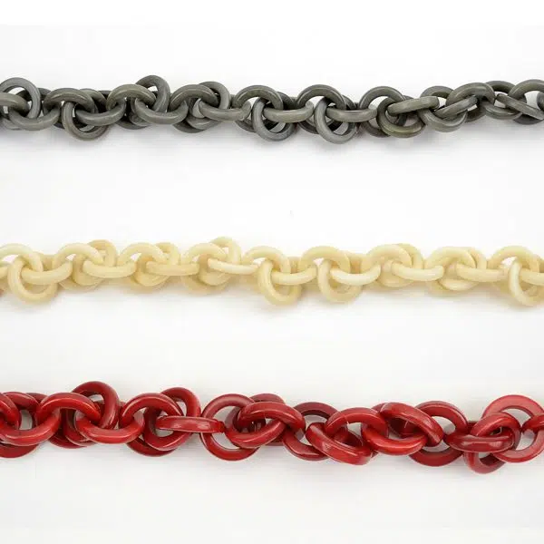 A picture of all three different colors for the helix necklace.