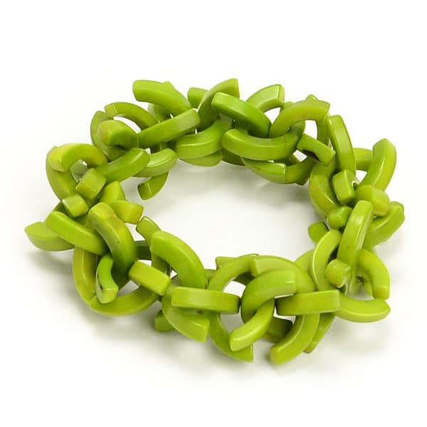 A close up of the green festival bracelet.