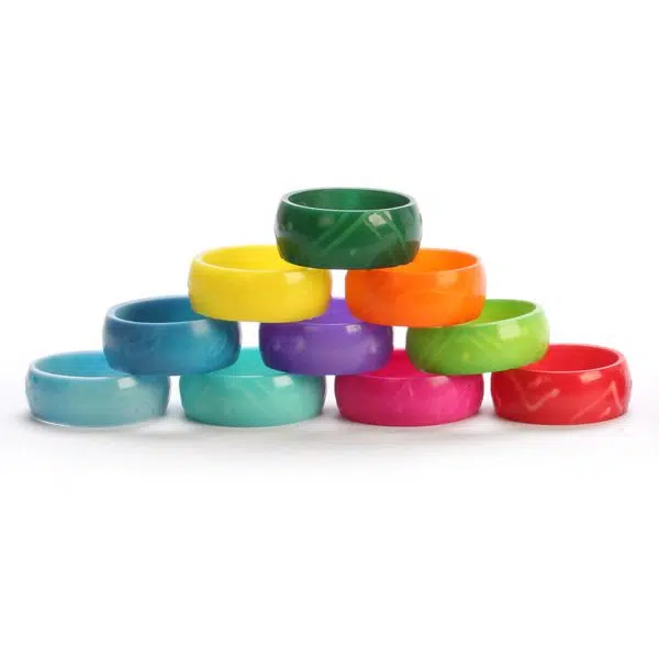 A picture of some colored tagua ring bands.