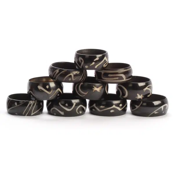 A picture of the tagua ring band in dark colors.