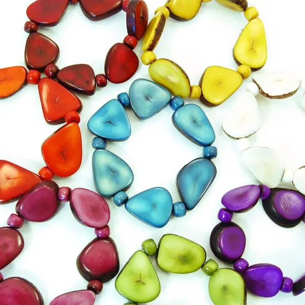 A picture with some thick slice bracelet, the colors that are in this picture are, turquoise, yellow, white, red, orange, magenta, green, and purple.