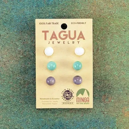 A picture of the tagua stud trio, comes in trendy colors, those colors are, white, blue, and purple.