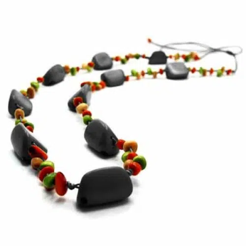 A close up picture of the chunky necklace, made from small tagua chips.