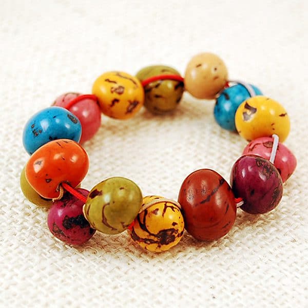 A colorful bracelet with pambil beads, that are braided together