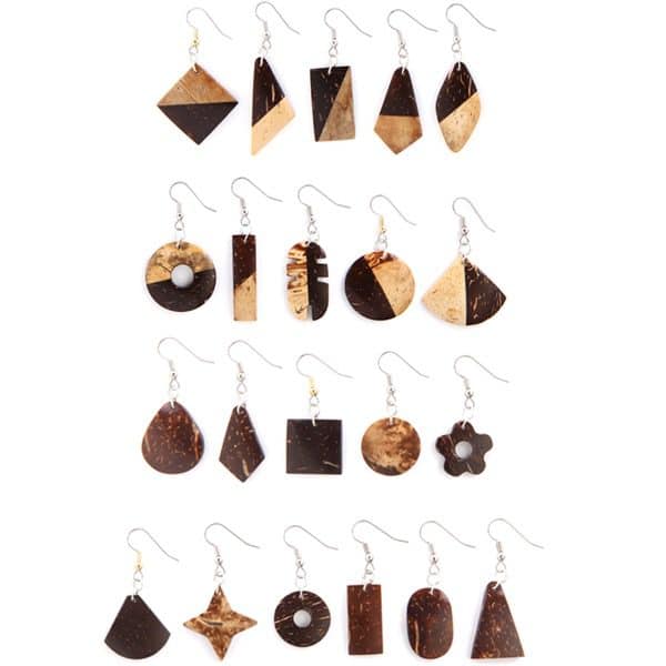 A picture of a bunch of different coconut earrings, coming in a verity of shapes and sizes..