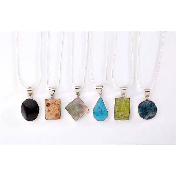 A picture of six different stone necklaces, comes in the color of, black, brown, clear, turquoise, green, and blue.