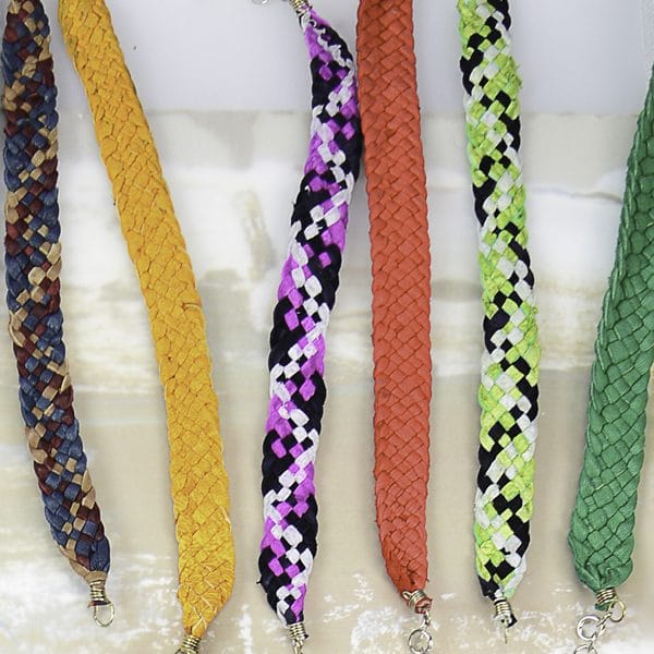 upcycled leather strands, that have been woven to form a lightweight bracelet, comes in a verity of colors.