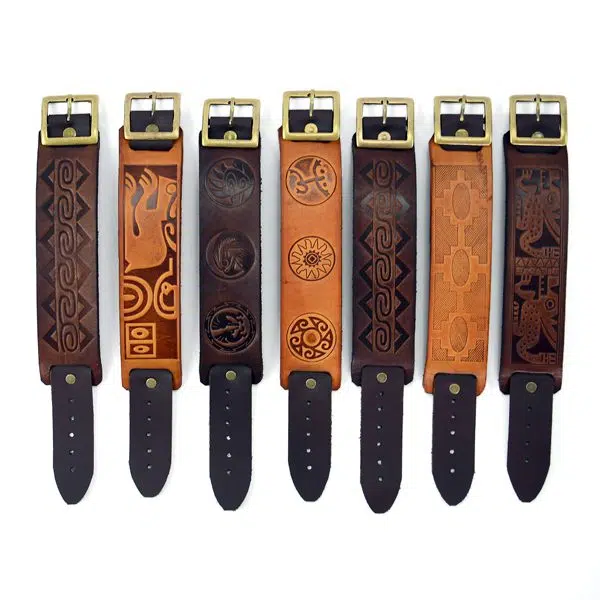 A picture of the six different leather bracelet, with designs on the leather bracelets,