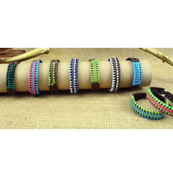 A picture of some of the colors that the leather devon bracelet comes in, those colors are, turquoise, blue/red, green/brown, blue/white, green, and blue