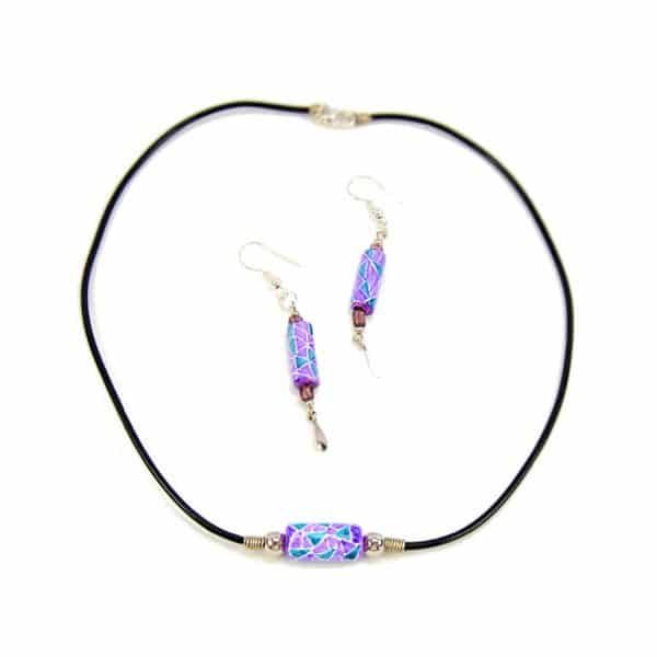 A picture of the painted bead set, has hand painted beads, coming in the color of purple and blue.