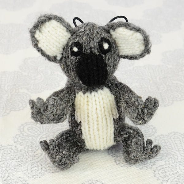 A catnip toy that looks like a koala, The toy has been hand knit with wool