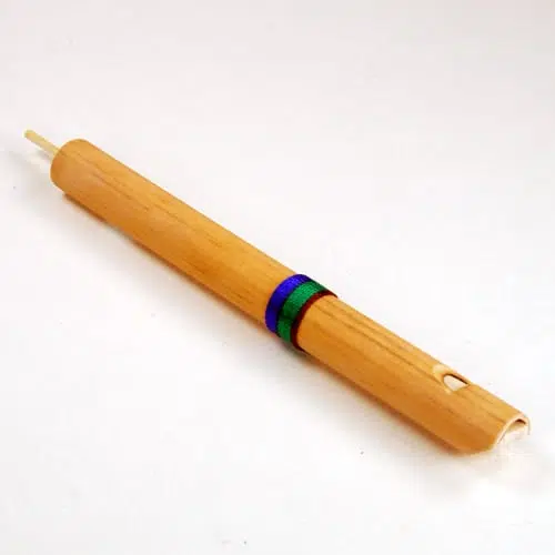 Small Bamboo Slide Flute with push and pull plunger to change pitch.