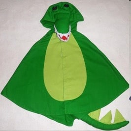 A small play cape that looks like a dinosaur