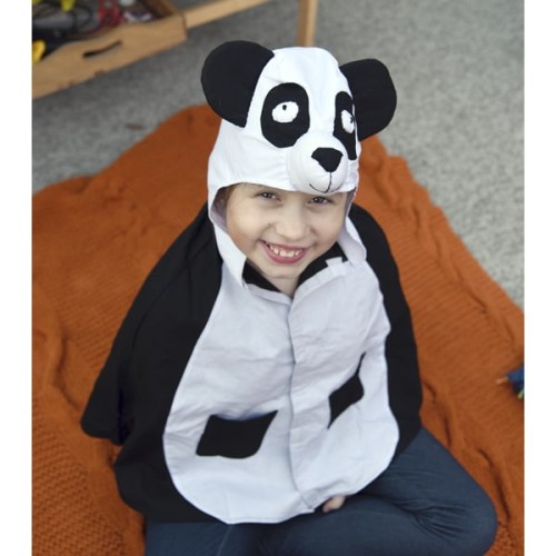 A young kid wearing a panda play cape