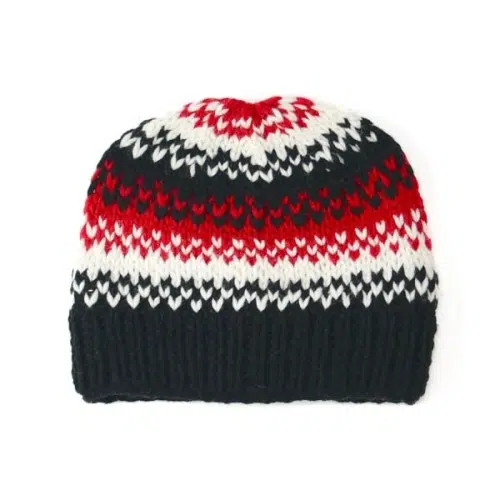 close up of the pixel hat showing the color and the design, this pixel hat has red, black, white