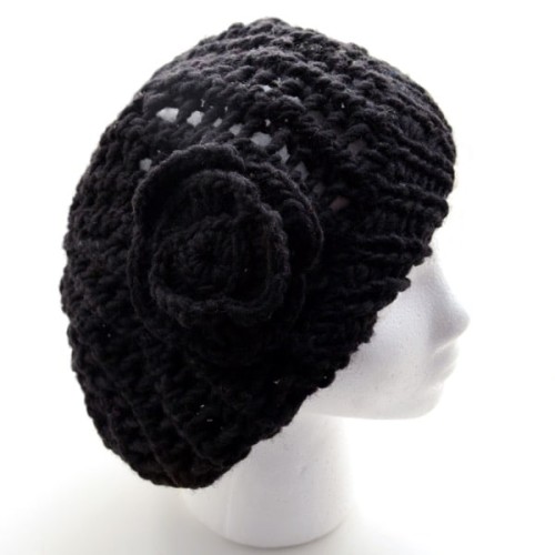 A crocheted hat, that comes in a verity of different colors, one size normally fits all