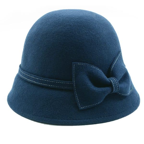 Tall blue hat in shape of a bell with a bow on it