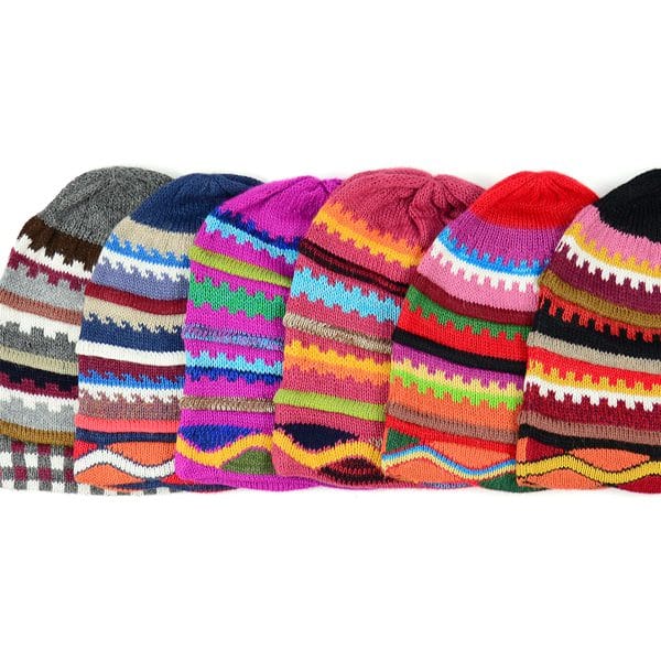 A bundle of the patterned alpacrylic hat showing all of the different colors and designs