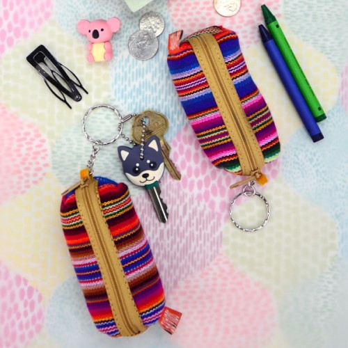 A close up of the carryall keychain, this key chain is meant to hold small items like, lip balm, hair clips, change, pens, and keys.