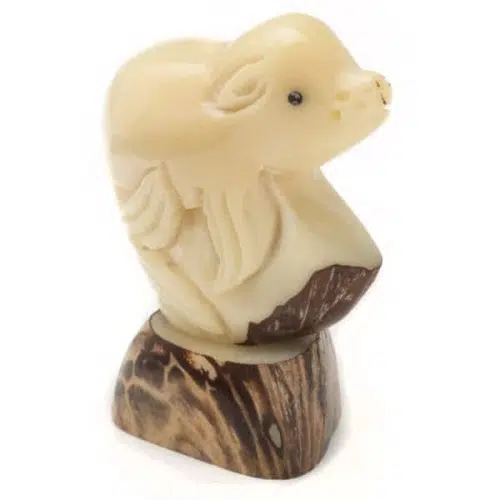A hand carved seal baby, hand carved from tagua seeds