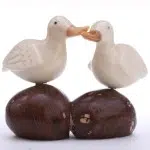 A pair of ducks hand carved from tagua nuts
