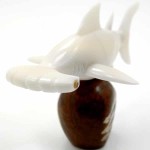 A shark hammerhead, hand carved from tagua seeds.