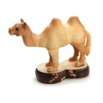 A Camel that has bee n carved out of a tagua nut