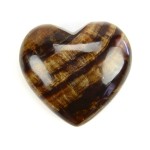 A highly polished, caramel, carved heart.