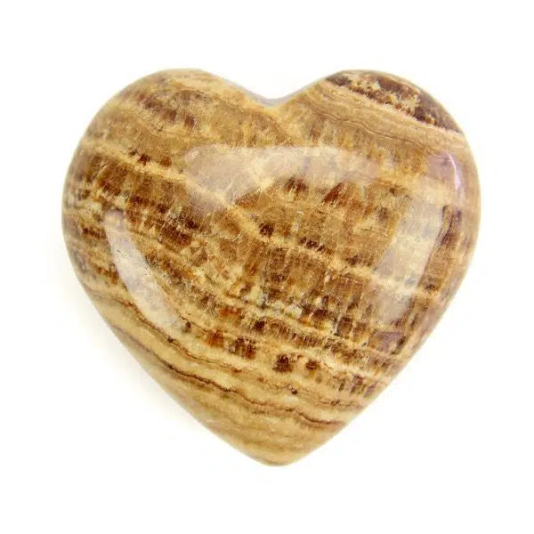 A highly polished aragonite carved heart