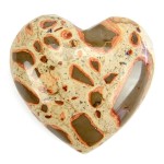 A highly polished, leopardite, carved heart