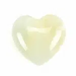 A highly polished white onyx carved heart
