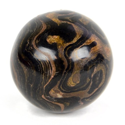 A highly polished stormatolite carved sphere