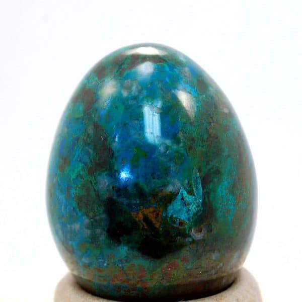 A highly polished, chrysocolla, carved egg